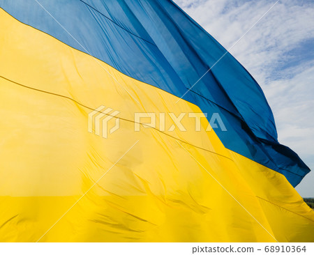 National flag of Ukraine by day. Kyiv aerial 68910364