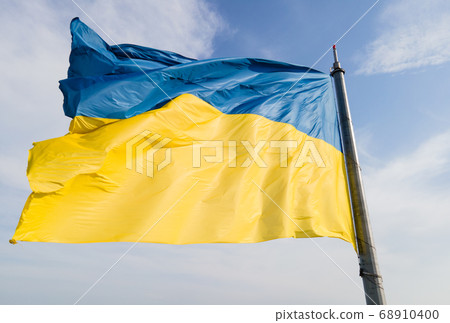 National flag of Ukraine by day. Kyiv aerial 68910400
