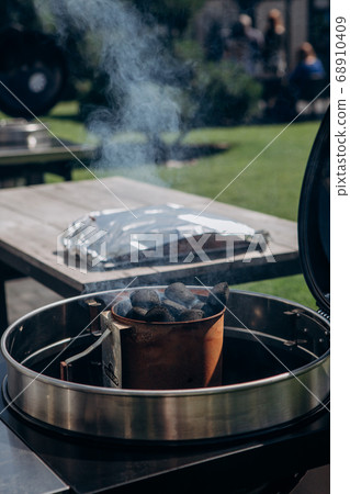charcoal smoke shiny stainless steel barbecue open charcoal smoke shiny stainless steel barbecue open 68910409