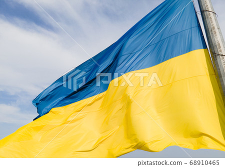 National flag of Ukraine by day. Kyiv aerial 68910465