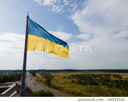 National flag of Ukraine by day. Kyiv aerial 68910502