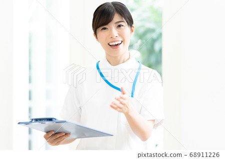 A smiling female nurse [portrait] 68911226
