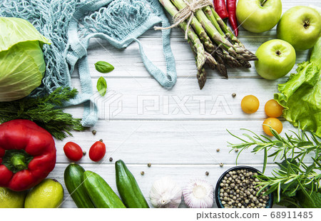 Fresh vegetables and fruits with a string bag 68911485