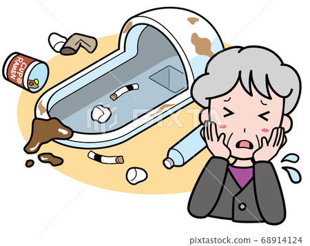 A grandmother who is troubled with a Japanese style toilet with scattered dust 68914124