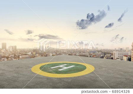 The helipad in the rooftop of the building The helipad in the rooftop of the building 68914326