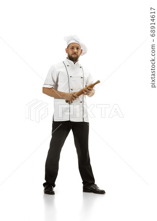 Cooker, chef, baker in uniform isolated on white background, gourmet. 68914617
