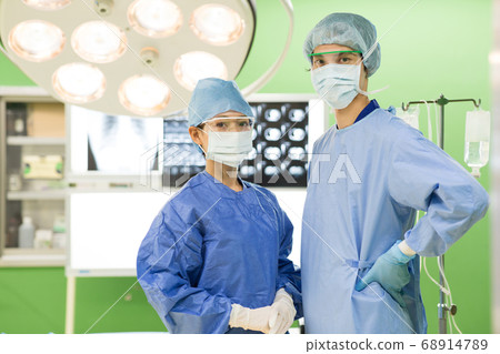 Medical staff wearing surgical clothes 68914789