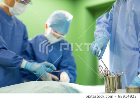 Medical staff wearing surgical clothes Medical staff wearing surgical clothes 68914922