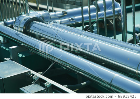 Silver plumbing on the roof 68915423