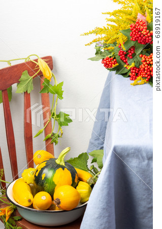 Fresh harvest of pumpkins on a table 68919167