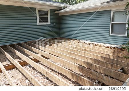 Construction of a new deck on back of house Construction of a new deck on back of house 68919395
