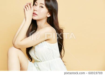 Beautiful flowers on green background 68919789