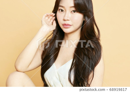 Beautiful flowers on green background 68919817