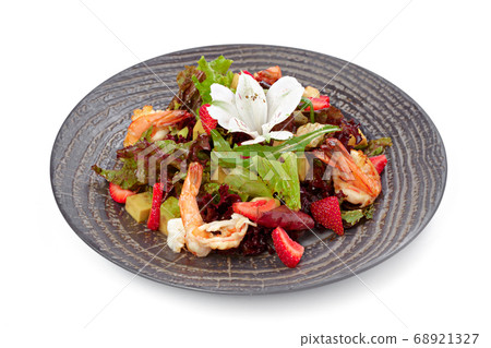 Salad with grilled shrimps isolated on white Salad with grilled shrimps isolated on white 68921327