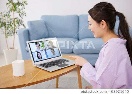 Young women having an online meeting 68921640