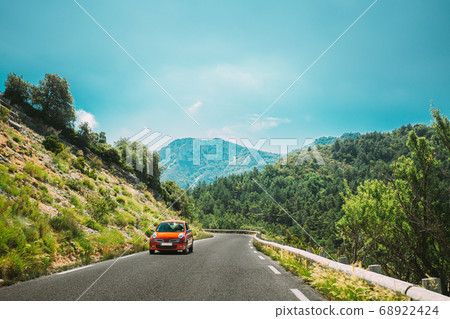 Provence-Alpes-Cote D'Azur, France. Red Car on mountains road. French mountain nature landscape the Gorges Du Verdon in France 68922424