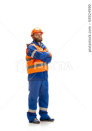 Handsome contractor, builder isolated over white studio background Handsome contractor, builder isolated over white studio background 68924990