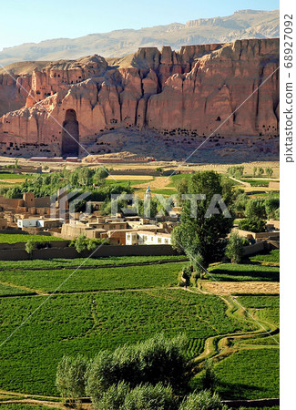Bamyan (Bamiyan) in Central Afghanistan. This is a view over the Bamyan (Bamiyan) Valley showing the large Buddha niche in the cliff. The Buddhas were destroyed by the Taliban. UNESCO site Afghanistan Bamyan (Bamiyan) in Central Afghanistan. This is a view over the Bamyan (Bamiyan) Valley showing the large Buddha niche in the cliff. The Buddhas were destroyed by the Taliban. UNESCO site Afghanistan 68927092