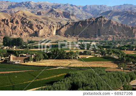 Bamyan (Bamiyan) in Central Afghanistan. This is a view over the Bamyan (Bamiyan) Valley showing the small Buddha niche in the cliff. The Buddhas were destroyed by the Taliban. UNESCO site Afghanistan 68927106