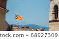 Catalonia flag waving in Barcelona. 68927309