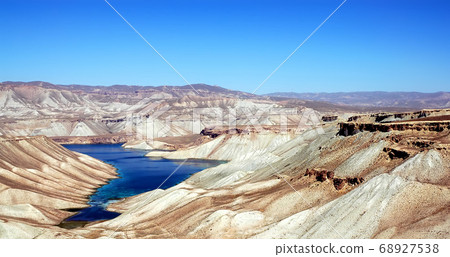 Band-e Amir lakes near Bamyan (Bamiyan) in Central Afghanistan. Band e Amir was the first national park in Afghanistan. This is the panorama from a viewpoint on the road to Band e Amir, Afghanistan. Band-e Amir lakes near Bamyan (Bamiyan) in Central Afghanistan. Band e Amir was the first national park in Afghanistan. This is the panorama from a viewpoint on the road to Band e Amir, Afghanistan. 68927538