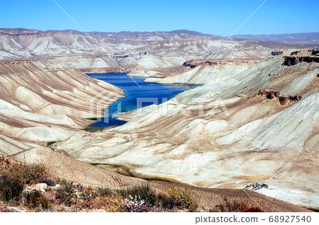 Band-e Amir lakes near Bamyan (Bamiyan) in Central Afghanistan. Band e Amir was the first national park in Afghanistan. This is the panorama from a viewpoint on the road to Band e Amir, Afghanistan. Band-e Amir lakes near Bamyan (Bamiyan) in Central Afghanistan. Band e Amir was the first national park in Afghanistan. This is the panorama from a viewpoint on the road to Band e Amir, Afghanistan. 68927540