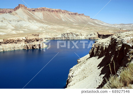 Band-e Amir lakes near Bamyan (Bamiyan) in Central Afghanistan. Band e Amir was the first national park in Afghanistan. This is the largest of the natural blue lakes at Band e Amir in the Hindu Kush. Band-e Amir lakes near Bamyan (Bamiyan) in Central Afghanistan. Band e Amir was the first national park in Afghanistan. This is the largest of the natural blue lakes at Band e Amir in the Hindu Kush. 68927546