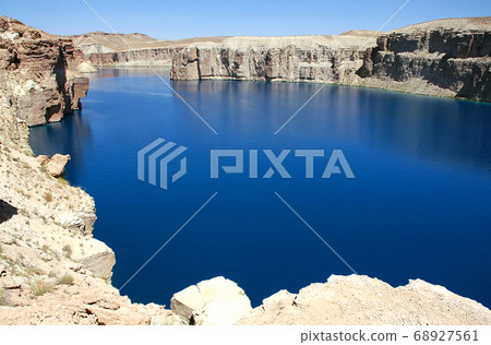 Band-e Amir lakes near Bamyan (Bamiyan) in Central Afghanistan. Band e Amir was the first national park in Afghanistan. This is the largest of the natural blue lakes at Band e Amir in the Hindu Kush. 68927561
