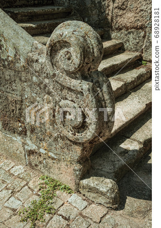 Close-up of stone staircase baluster with carved decoration Close-up of stone staircase baluster with carved decoration 68928181