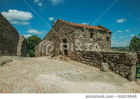 House made of stone on deserted alley 68928648