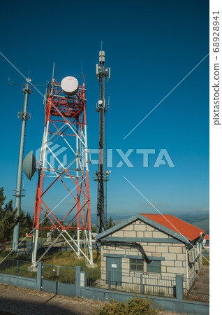 Telecommunication towers on a base transceiver station 68928941