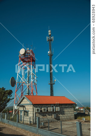 Telecommunication towers on a base transceiver station 68928943