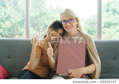 portrait Senior woman and young daughter portrait Senior woman and young daughter 68930147