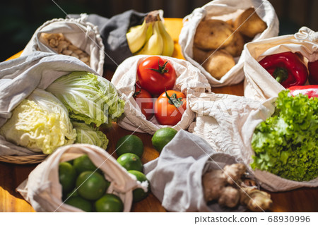 set of reusable and zero waste cotton shopping bags for food 68930996