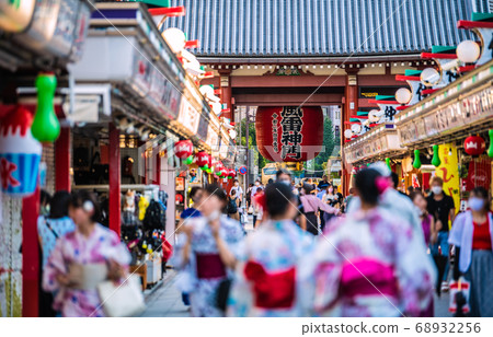 Tokyo cityscape in Japan A crowd of Sensoji Temple in Tokyo. People who took off their masks while their masks stand out = August 21 68932256