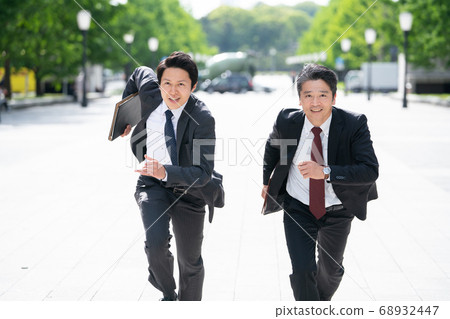 Business man running at full power Business man running at full power 68932447