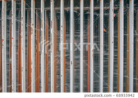 Radiator grille from the air conditioner texture. Radiator grille from the air conditioner texture. 68933942