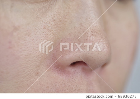 Female nose around hair 68936275