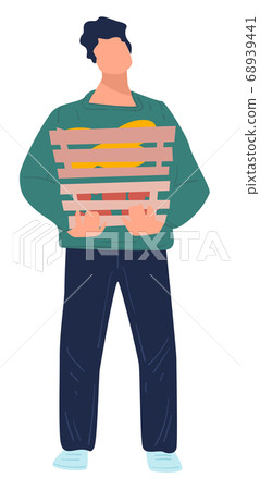 Farmer carrying basket filled with vegetables and fruits Farmer carrying basket filled with vegetables and fruits 68939441