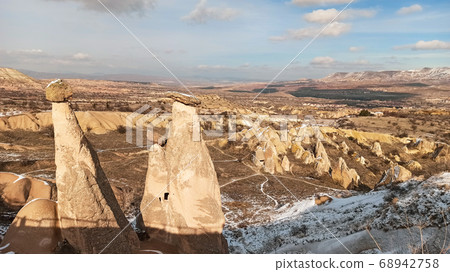 Three beauties or three graces unusual volcanic rock formation in Cappadocia. The most famous fairy chimneys in Cappadocia. 68942758