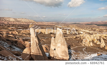 Three beauties or three graces unusual volcanic rock formation in Cappadocia. The most famous fairy chimneys in Cappadocia. 68942761