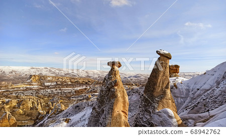 Three beauties or three graces unusual volcanic rock formation in Cappadocia. The most famous fairy chimneys in Cappadocia. 68942762