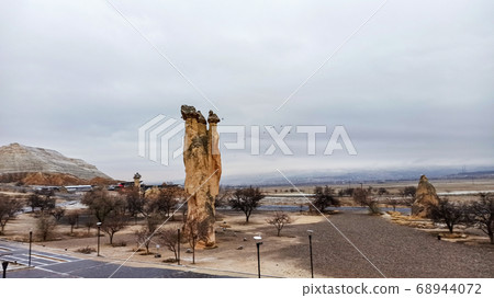 Fairy Chimneys at Pasabag, the valley of the monks in Goreme. Rock Formations with multihead stone mushroom fairy chimneys in Pasabag, Cappadocia, Turkey 68944072