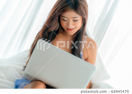 Sexy Asian woman is making sensuality video Sexy Asian woman is making sensuality video 68945470