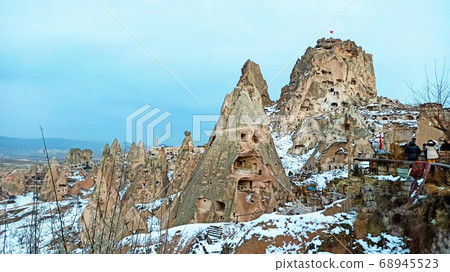 Cave houses and monasteries carved into Tufa Rocks at Zelve Open Air Museum (Zelve Valley) in winter season in Cappadocia, Turkey Cave houses and monasteries carved into Tufa Rocks at Zelve Open Air Museum (Zelve Valley) in winter season in Cappadocia, Turkey 68945523