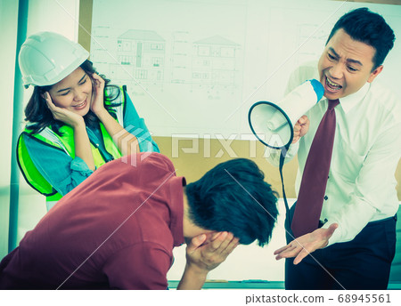 Unhappy Construction team Boss is shouting Unhappy Construction team Boss is shouting 68945561