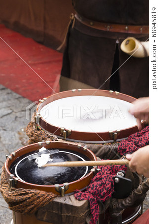 street musician playing street musician playing 68945819