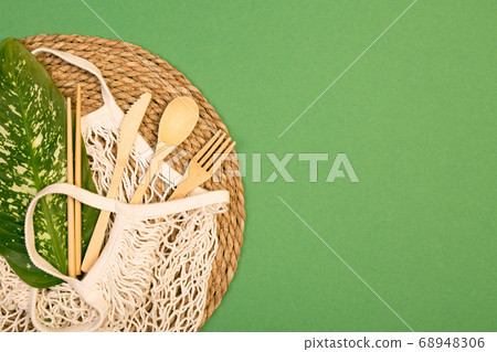 Reusable wooden cutlery and grocery bag. Eco 68948306