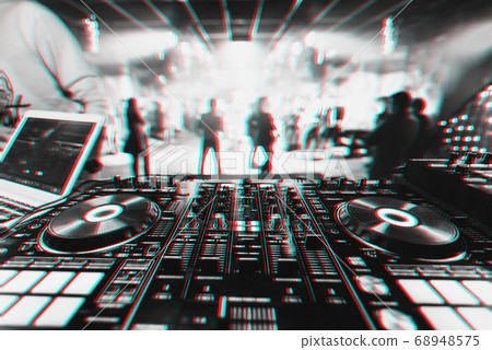 professional DJ music mixer at a party at an music concert professional DJ music mixer at a party at an music concert 68948575