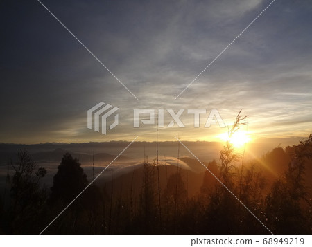 Sunrise seen from the summit Sunrise seen from the summit 68949219